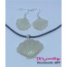 Set of earrings and medallion in shape of sea shells
